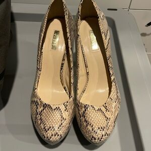 Size 9 snakeskin platform pumps in excellent condition